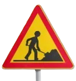 Triangle jaune de signalisation avec un ouvrier tenant une pelle, texte français en chantier en dessous, indiquant que le site est en cours de construction, ton neutre et informatif, sur un fond évoquant un chantier